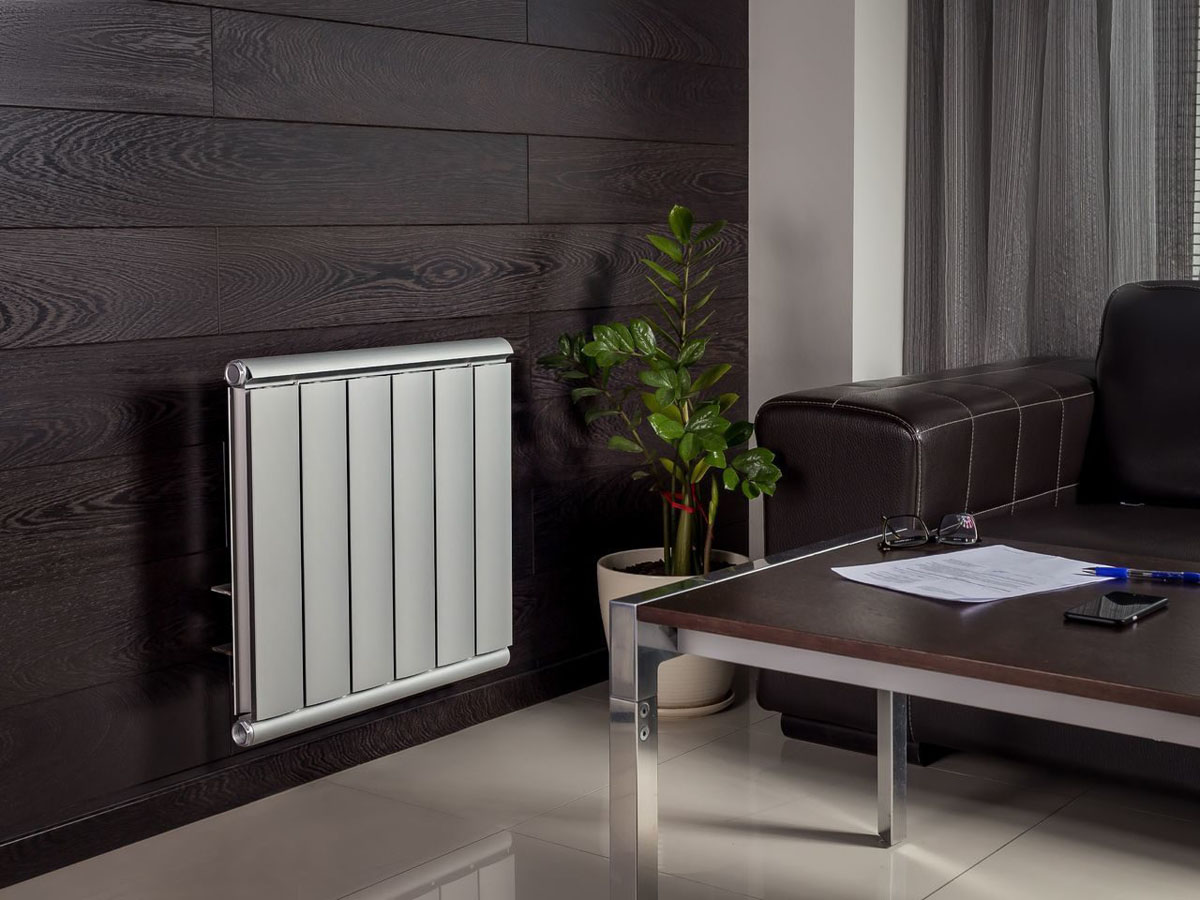 Радіатори опалення в дизайні кімнати, ефективне тепло та естетичний вигляд