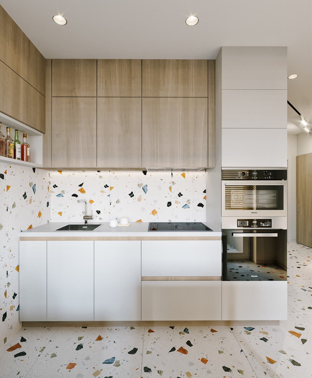 Практичний дизайн кухні з вбудованою технікою, що відповідає концепції робочого трикутника.