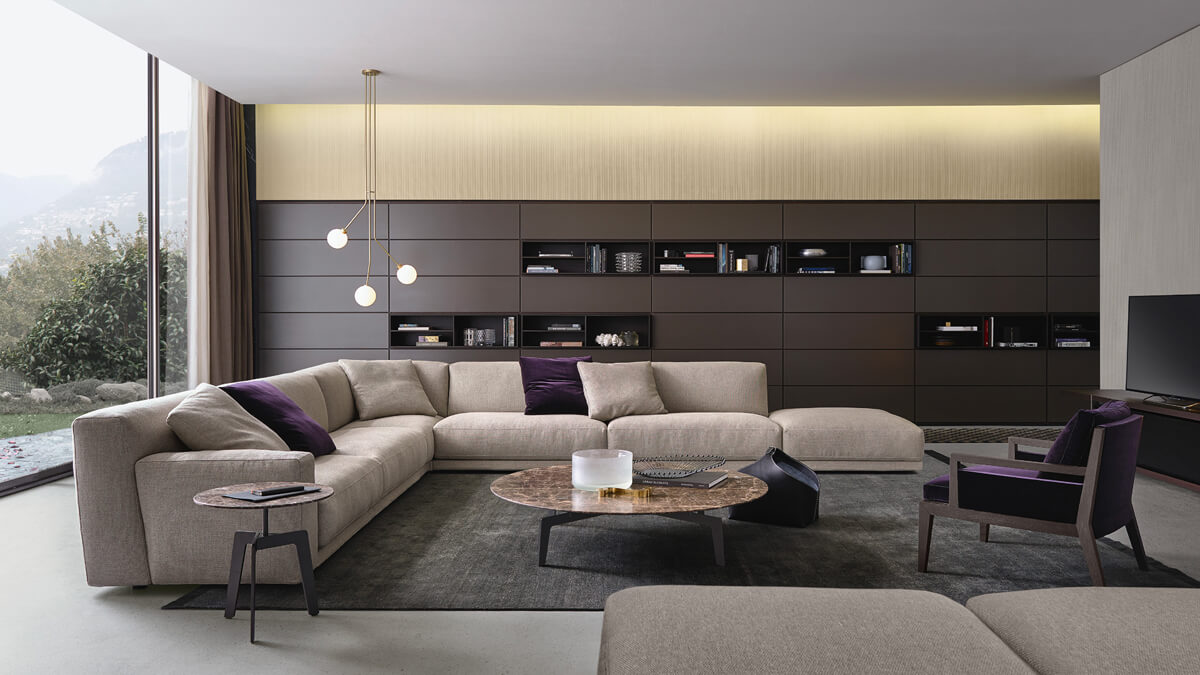 Сучасний дизайн вітальні з акцентом на зонуванні простору та функціональності інтер'єру