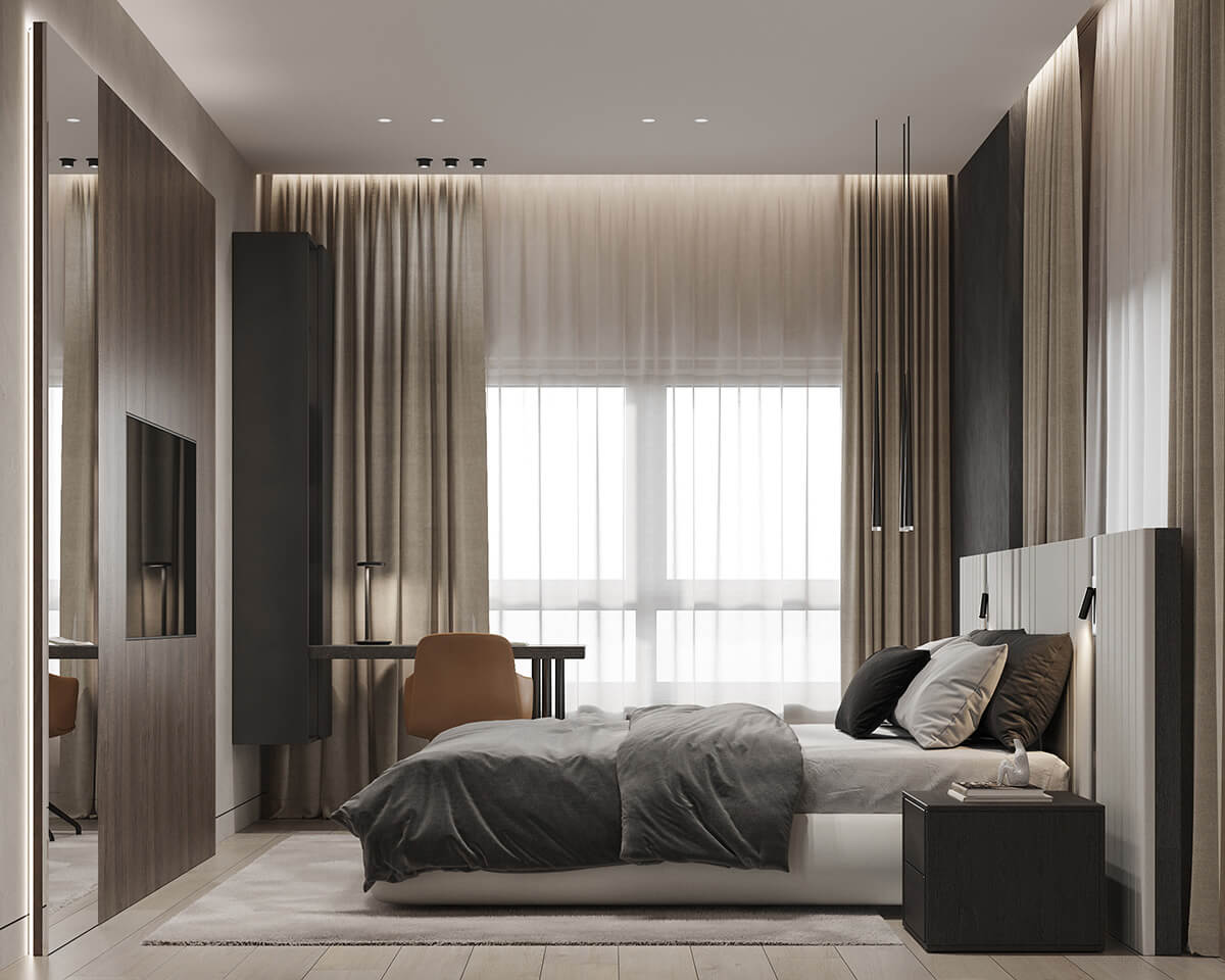 Затишна робоча зона в спальні з м'яким килимом та теплим освітленням.