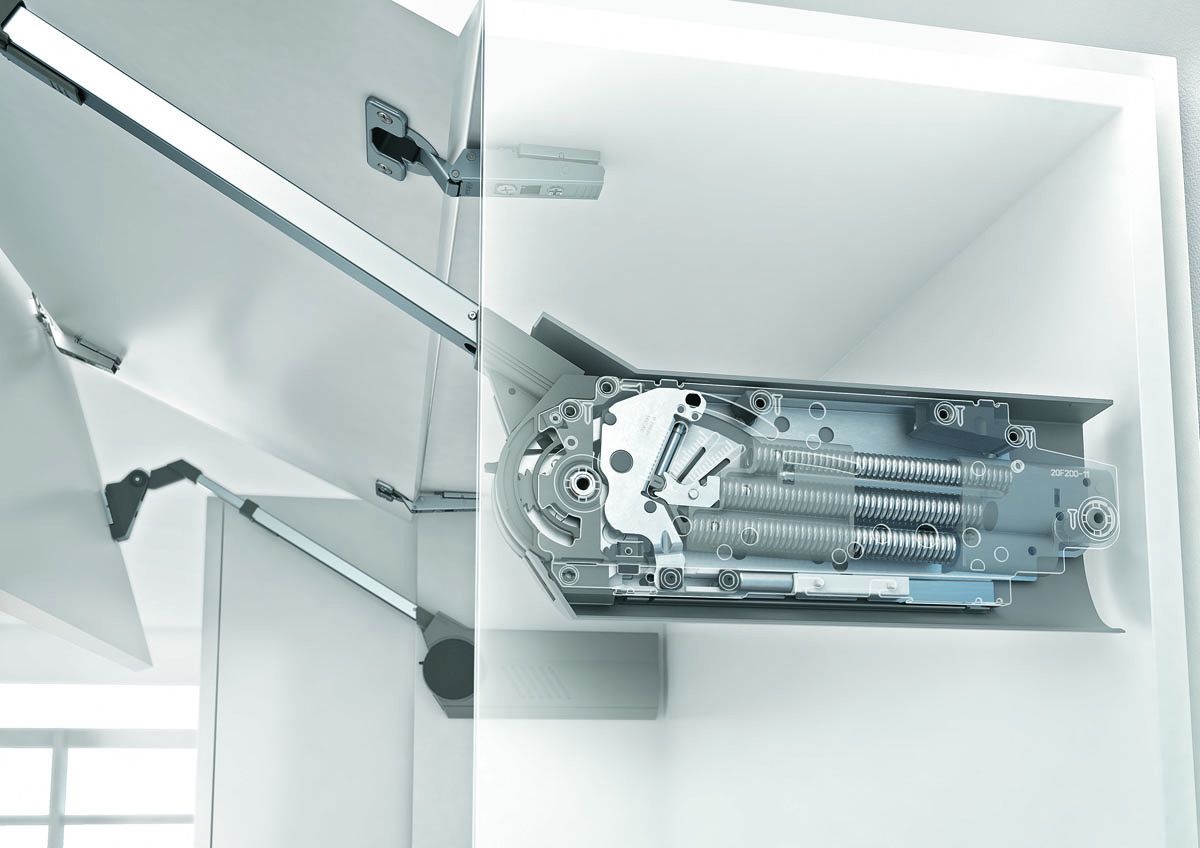 Набір якісної фурнітури для кухні: петлі, ручки та механізми шухляд.