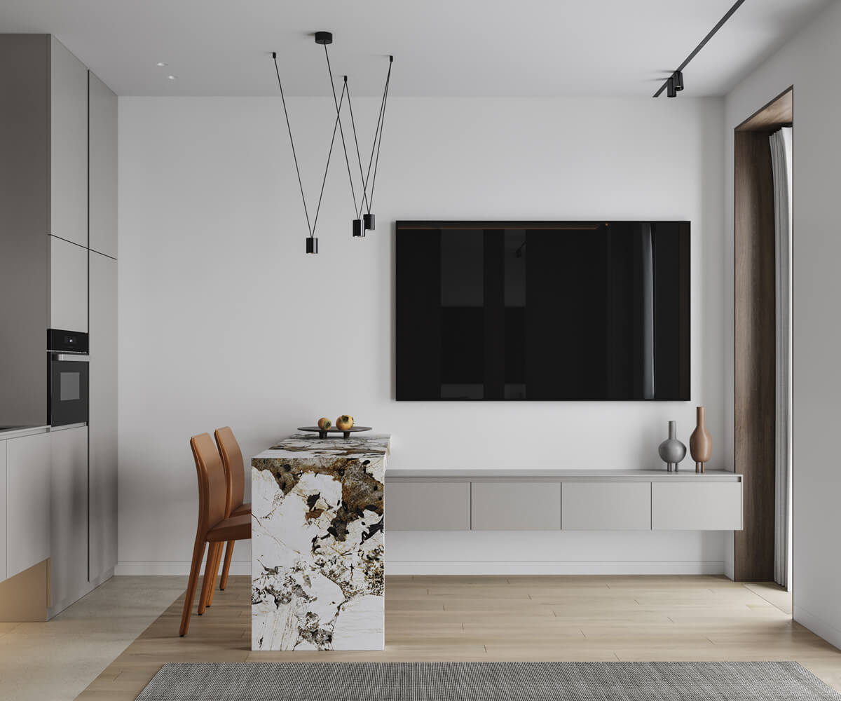 Мінімалістичний дизайн кухні-вітальні в сірих тонах з акцентом на функціональність.