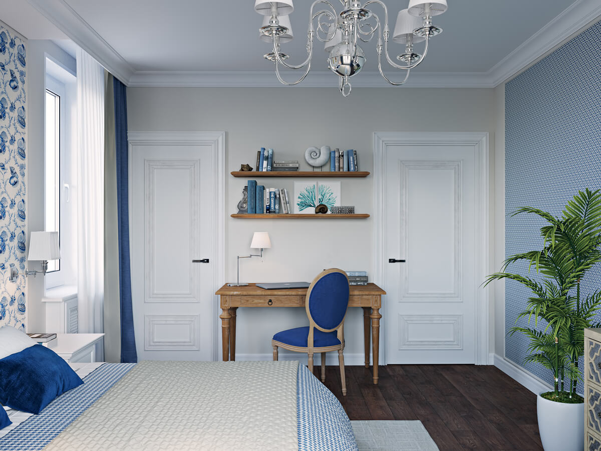 Дизайн синьо-білої спальні: білі стіни, синя постіль і декор в морському стилі.