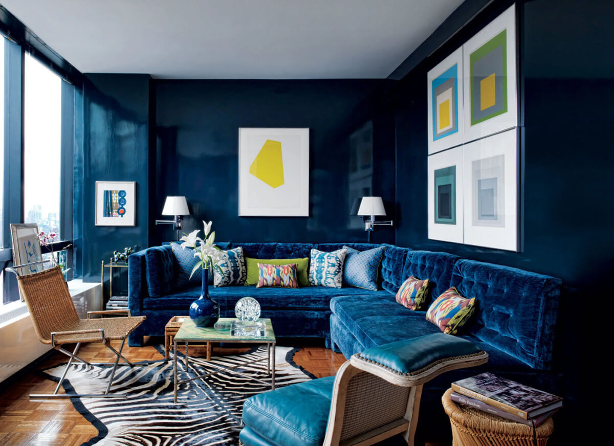 Дизайн дитячої кімнати в сіро-жовтих тонах: ігрова зона з жовтими акцентами на сірому фоні.