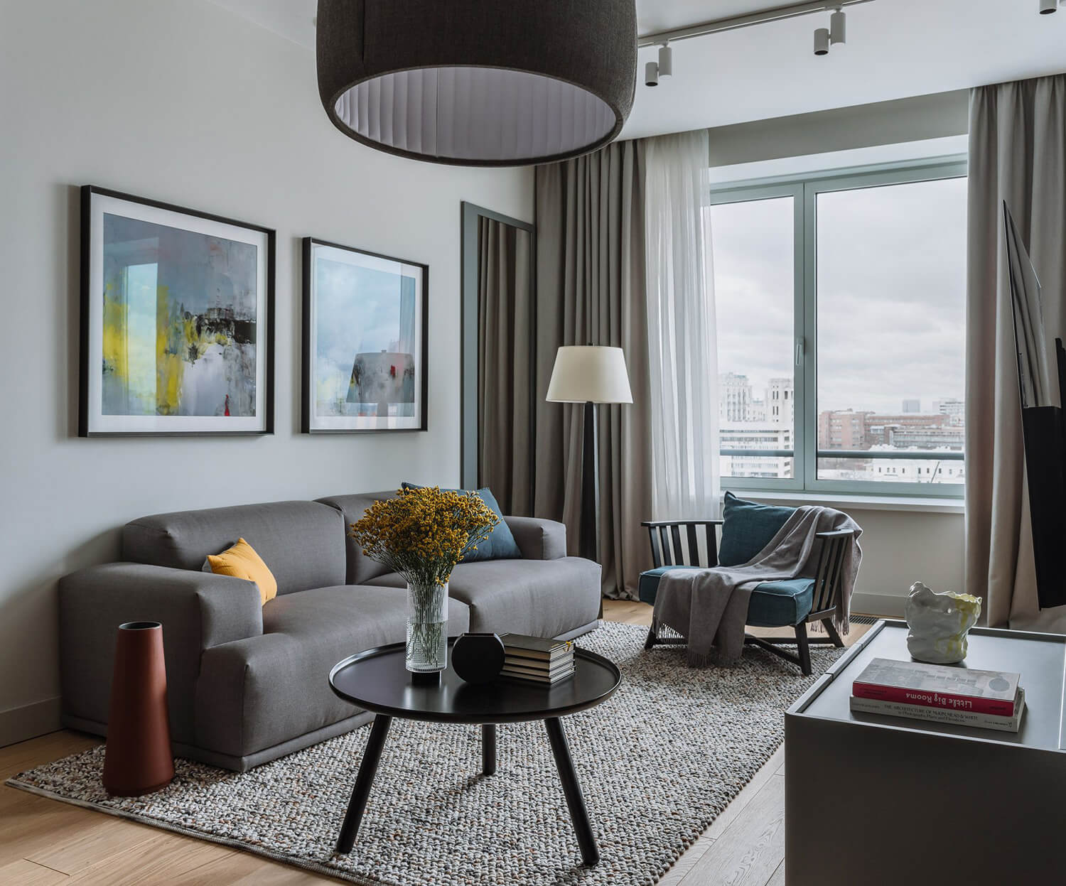 Сучасний дизайн двокімнатної квартири з елегантними меблями та світлим інтер'єром, ідеально для сім'ї
