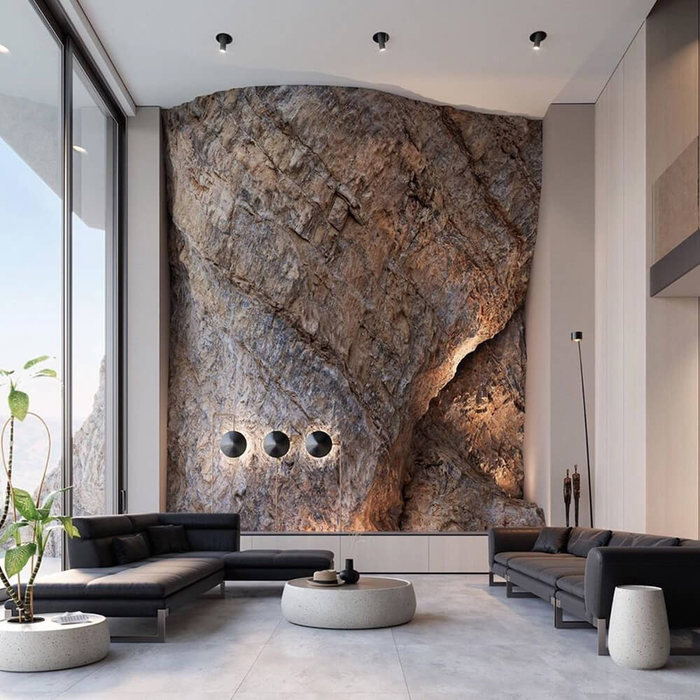 Стіна-скеля в інтер'єрі кабінету: декоративна штукатурка під камінь для створення атмосфери спокою та зосередженості.