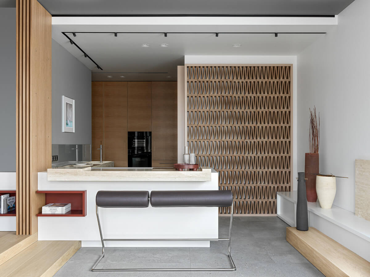 Конструктивізм в інтер'єрі: поєднання мінімалізму та радянського модернізму в дизайні вітальні.