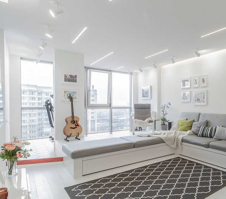 Дизайн квартири з подіумом: організація простору та зонування у сучасному інтер'єрі.