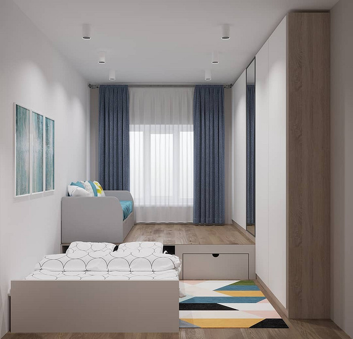 Сучасний дизайн з подіумом, який використовується як робочий простір у квартирі-студії.