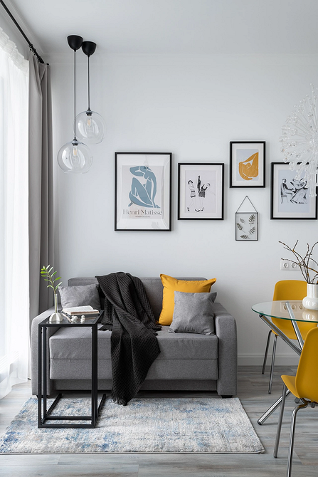 Дизайн невеликої кімнати з використанням багатофункціональних меблів та вертикального озеленення.