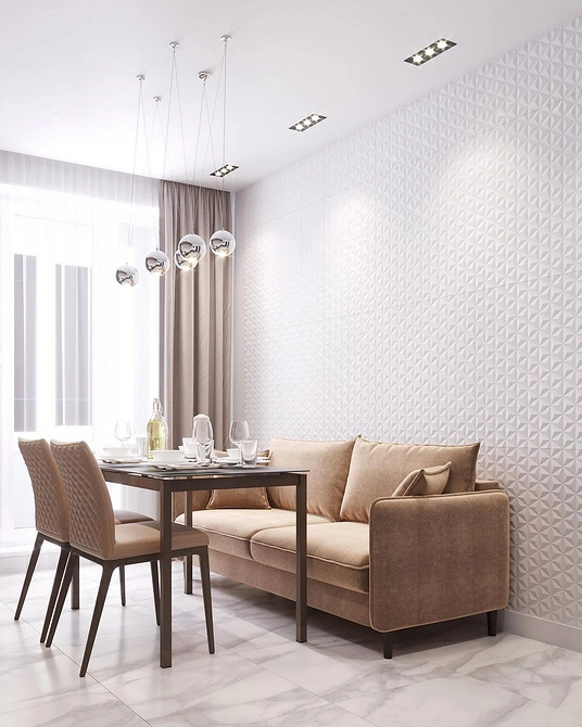 Затишна дитяча кімната з бежевим диваном: м'які тони та безпечні матеріали для малюків.