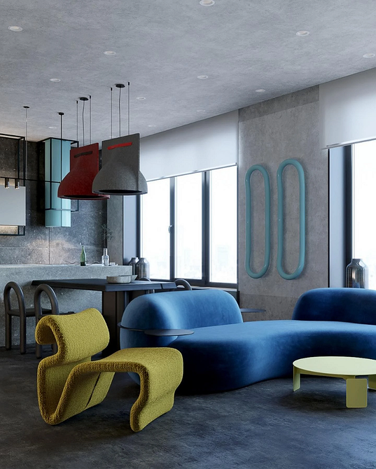 Світлий монохромний диван з дерев'яними ніжками в мінімалістичному інтер'єрі.