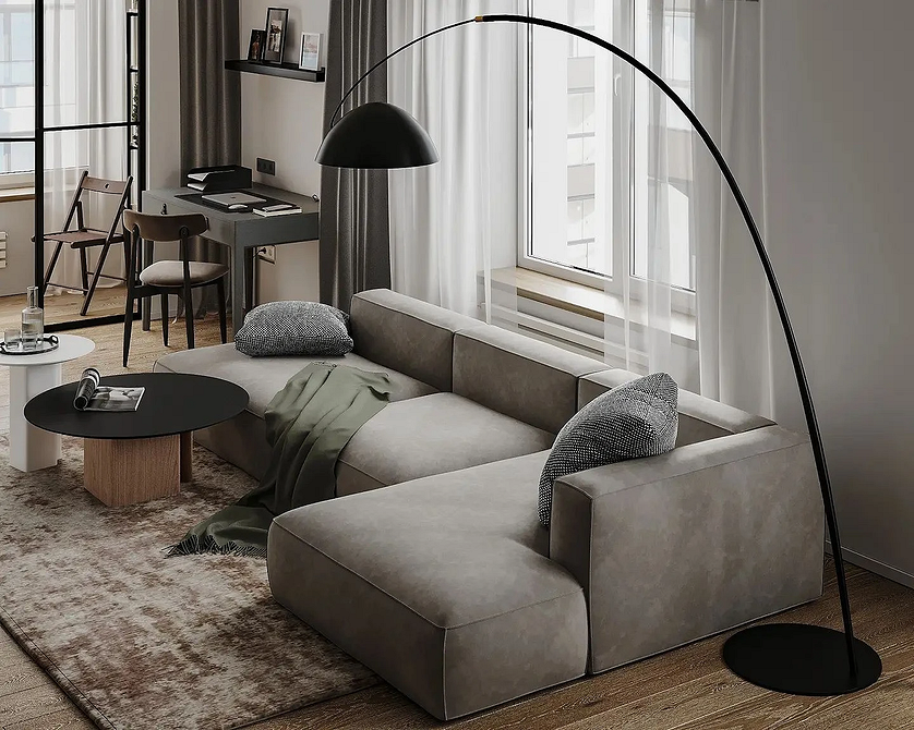 Великий кутовий диван у вітальні в стилі мінімалізму з акцентом на функціональність