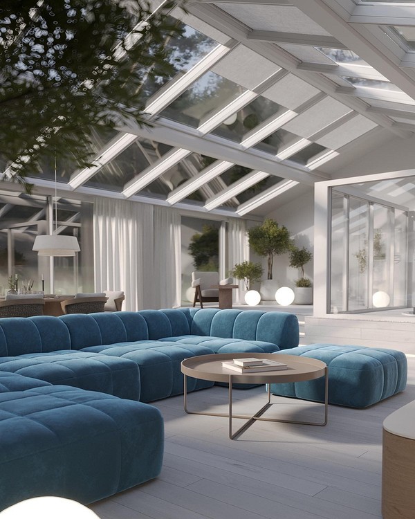 Великий диван у вітальні в стилі мінімалізму з акцентом на функціональність.