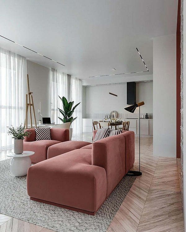 Дизайн вітальні з монохромним диваном, що відображає сучасні тренди інтер'єру.