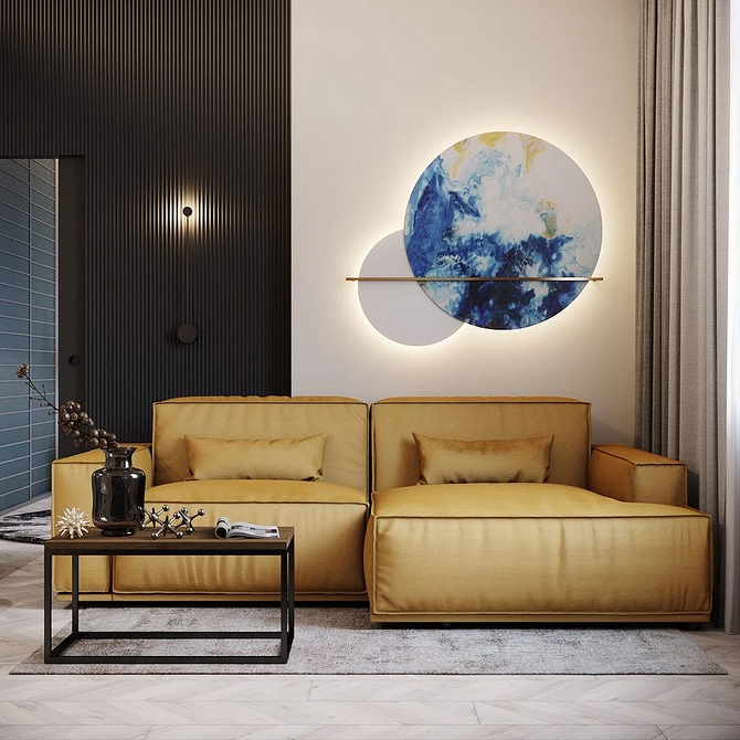 Стильний монохромний дизайн вітальні з диваном та журнальним столиком.