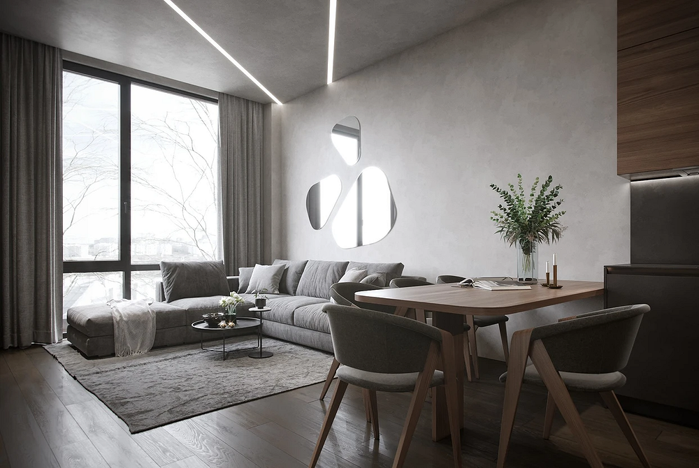 Диван з елегантною оббивкою у вітальні, сучасні тенденції дизайну меблів