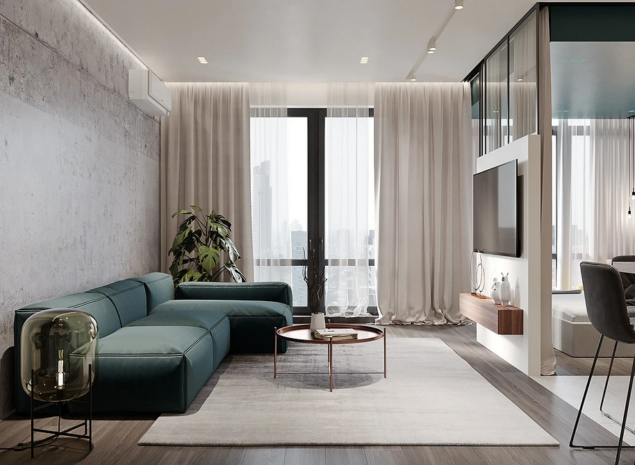 Диван у світлих тонах з плавними лініями в монохромному інтер'єрі вітальні.