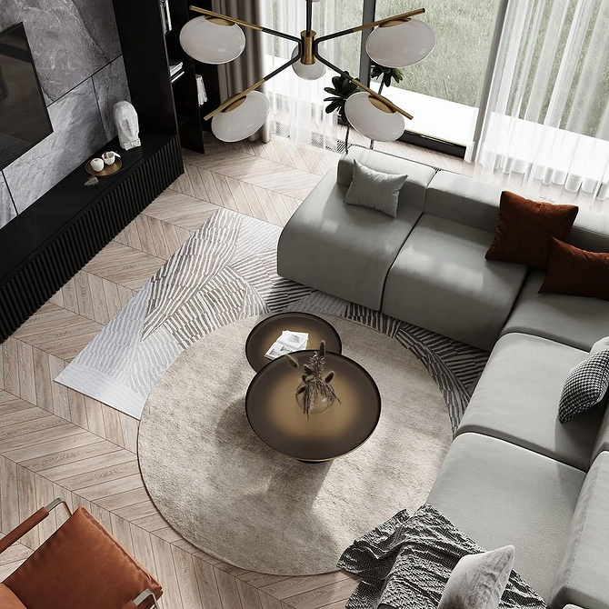 Елегантний диван з оббивкою нейтрального кольору в інтер'єрі вітальні.