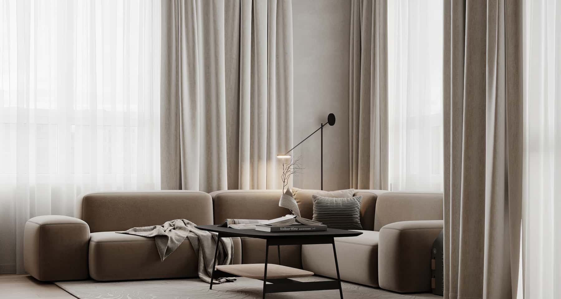 Сучасний дизайн інтер'єру: поєднання мінімалізму та лофту в сіро-бежевій гамі.