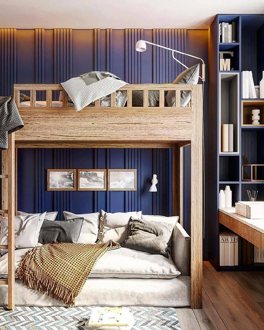 Компактне двоярусне ліжко з диваном та шафою для зберігання речей в дитячій.