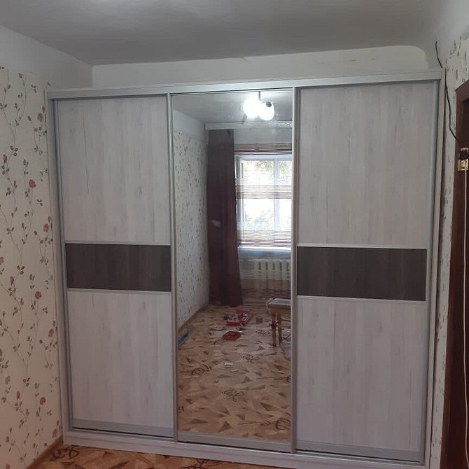 Застаріла модель шафи, яка не підходить для сучасного інтер'єру 2024