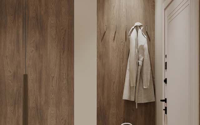 Сучасний дизайн маленької квартири з балконом, перетвореним на затишну зону відпочинку.