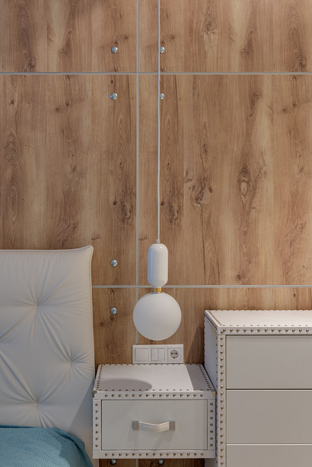 Диван капітоне з каретною стяжкою у вітальні: розкіш та комфорт