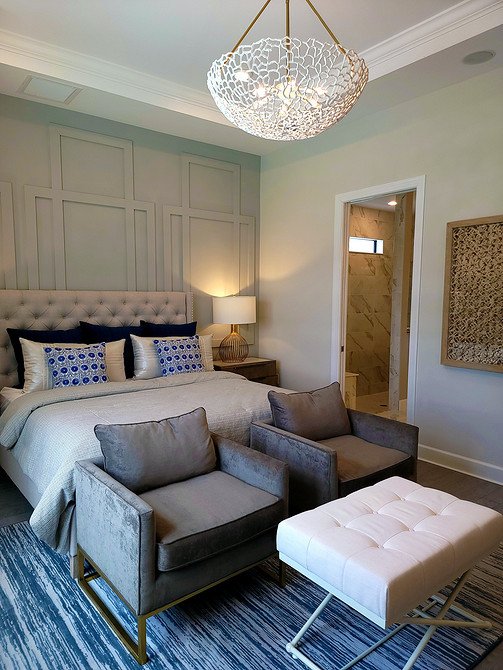 М'які меблі з каретною стяжкою: розкішний пуф у вітальні з елементами капітоне