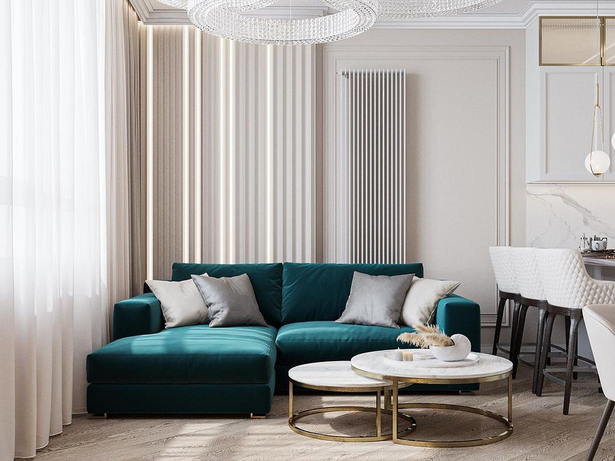 Дизайн вітальні з бірюзовим диваном, журнальним столиком та сучасними світильниками, м'які меблі