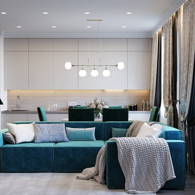 Інтер'єр кімнати з бірюзовим диваном, жовтими подушками та оригінальним декором, поєднання кольорів