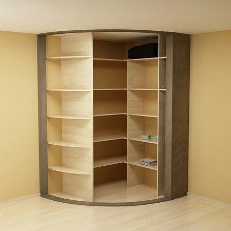 Елегантна кутова шафа в спальні з підсвіткою, що додає особливого шарму та затишку.