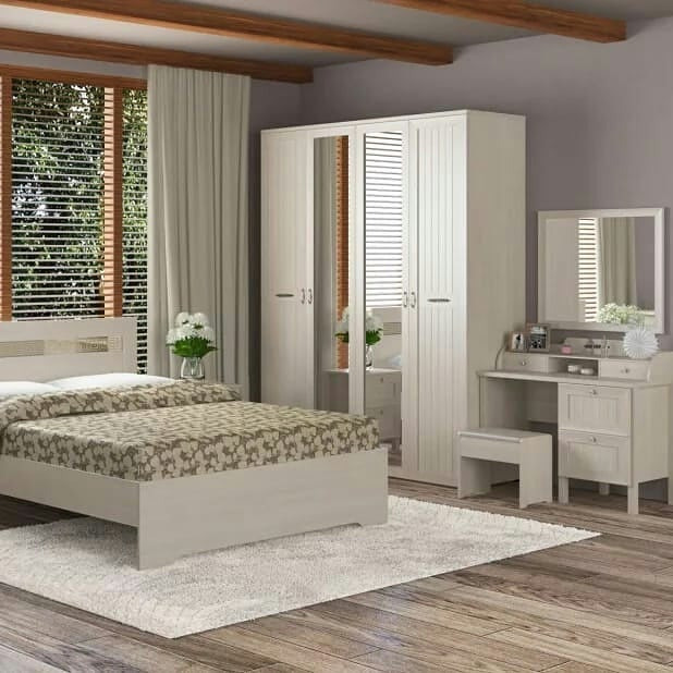 Продуманий дизайн спальні з кутовою шафою для ефективного зберігання речей