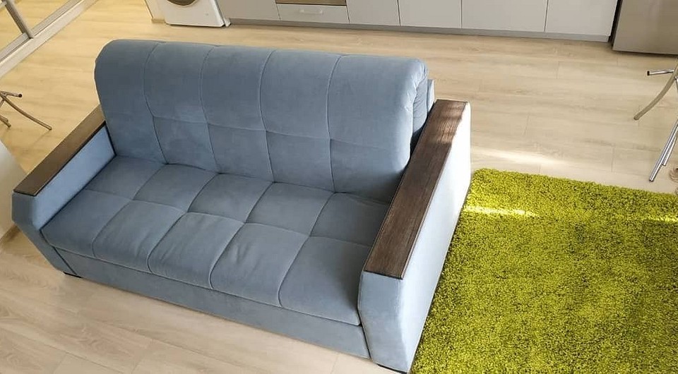 Кутовий диван акордеон, зручне рішення для великої родини та просторої кімнати.