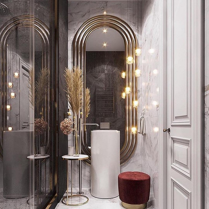 Компактний пуфик в інтер'єрі вітальні, зручне місце для відпочинку ніг та стильний аксесуар.