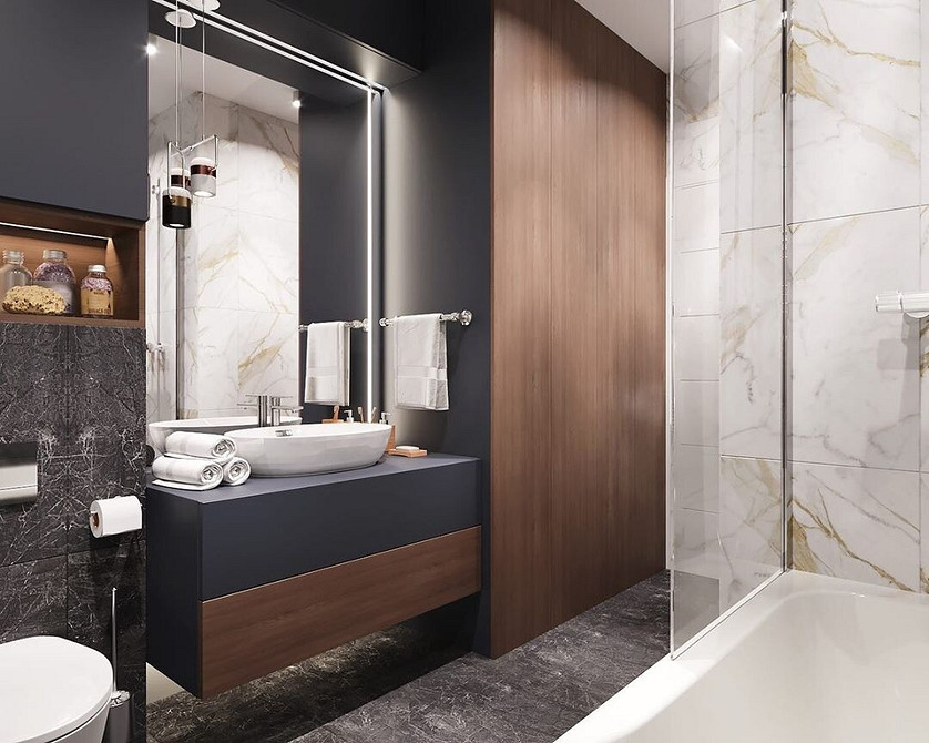 Освітлення у ванній кімнаті: дзеркала з підсвічуванням для створення затишної атмосфери.