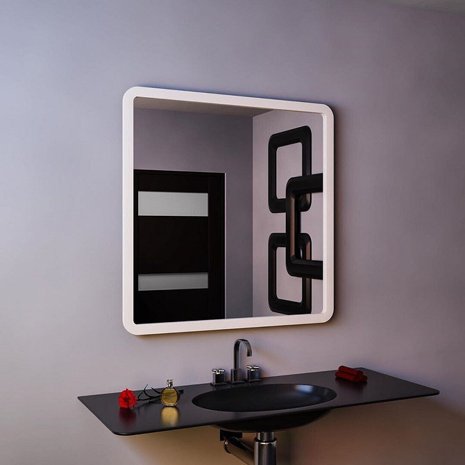 Дизайн маленької ванної кімнати з використанням мінімалістичного стилю та натуральних матеріалів.