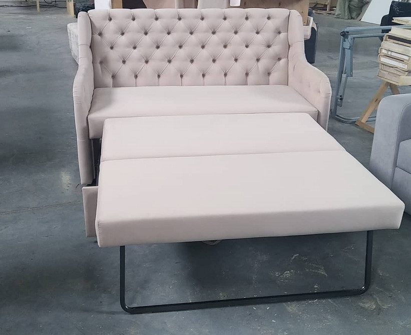 Елегантний диван з подушками: критерії вибору дивану для комфортного сну