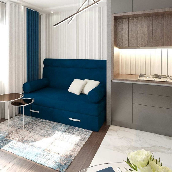 Диван мінімалістичного дизайну для сучасної вітальні в світлих тонах