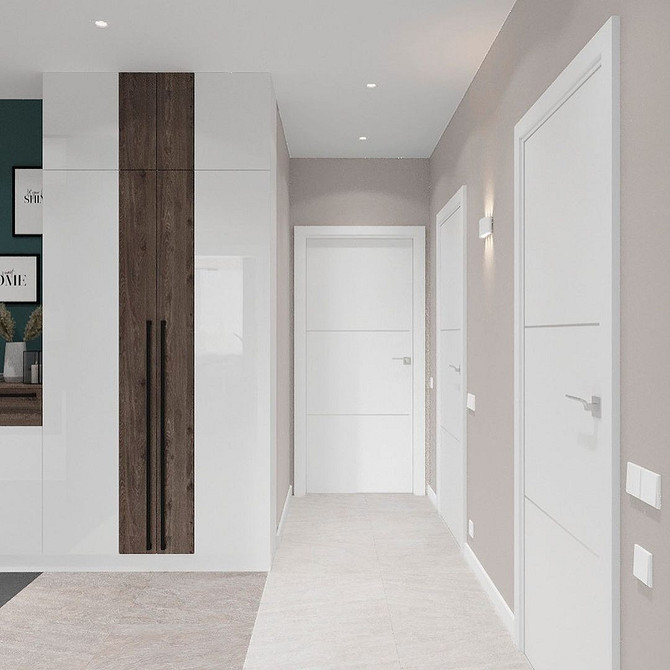 Сучасна шафа в передпокій з дзеркальними дверцятами для візуального збільшення простору