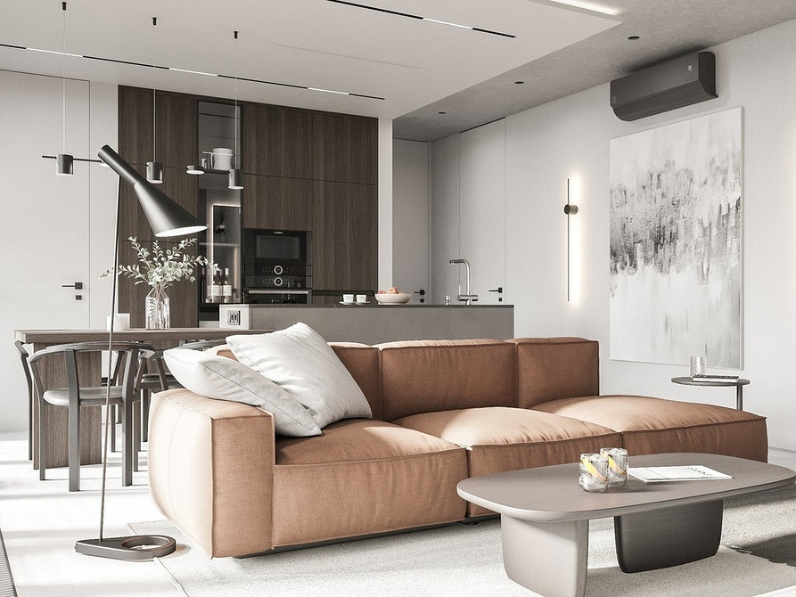 Розкішний шкіряний коричневий диван в інтер'єрі, коричневий колір додає тепла.