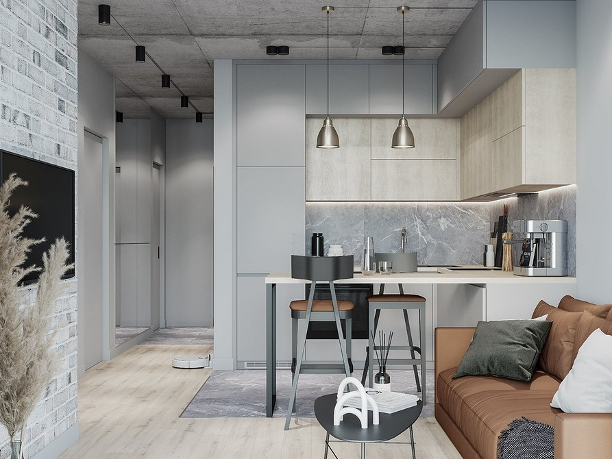 Стильний коричневий шкіряний диван у мінімалістичному інтер'єрі з дерев'яними елементами