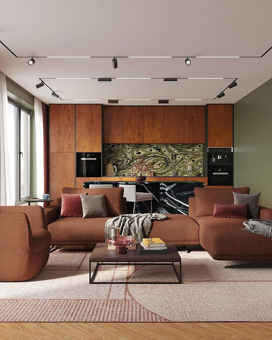 Класичний коричневий диван в інтер'єрі: традиційний дизайн, вибір матеріалів та поєднання з антикваріатом.