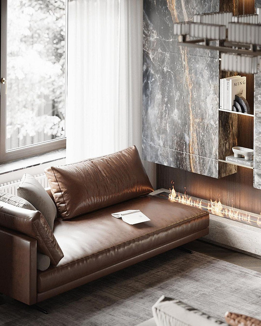 Затишна вітальня з великим коричневим диваном та декоративними подушками для комфорту