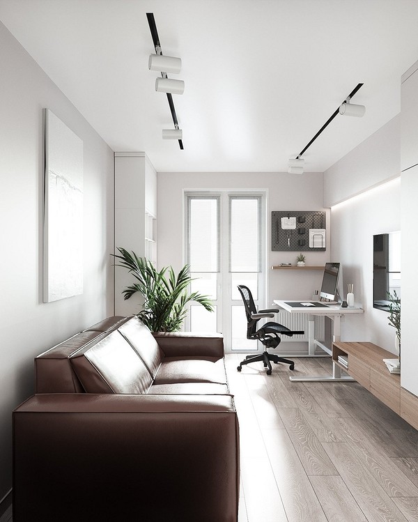 Затишний кутовий коричневий диван у вітальні з декоративними подушками, місце для відпочинку