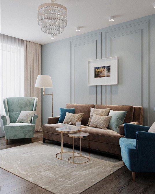 Коричневий шкіряний диван в інтер'єрі з акцентними стінами та сучасним освітленням