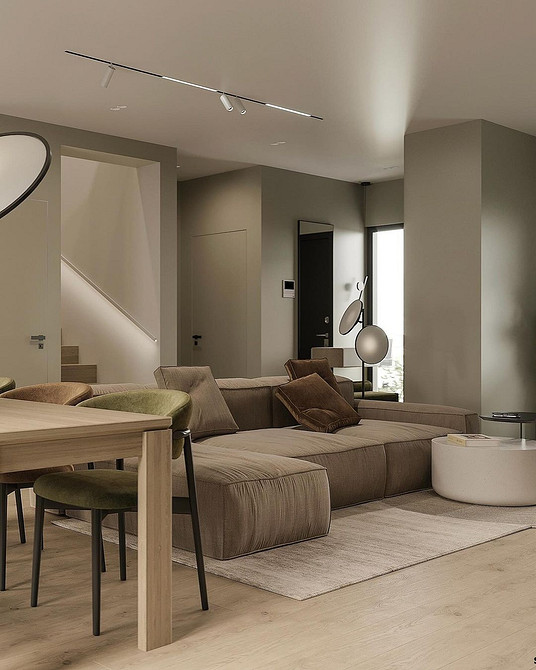 Дизайн вітальні з коричневим диваном: створення затишного та комфортного простору