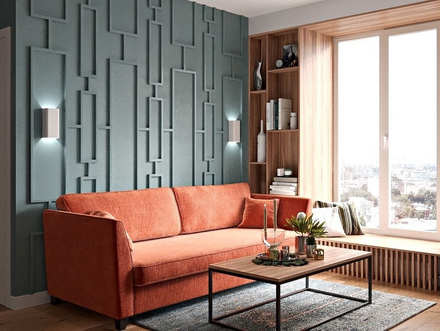 Вітальня з червоним диваном та зеленими рослинами: природна свіжість в інтер'єрі