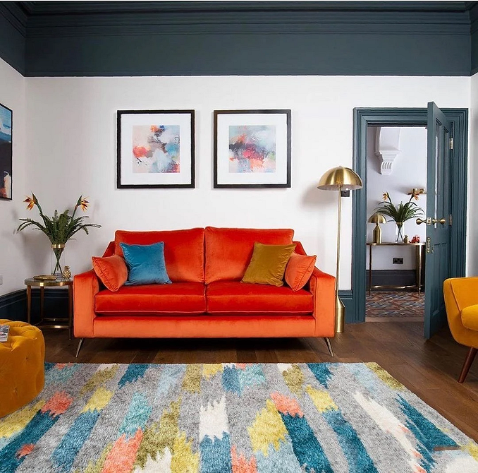 Червоний диван в інтер'єрі: ідеї для створення затишної атмосфери у вітальні