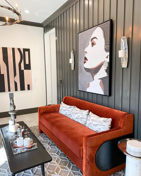 Червоний шкіряний диван в інтер'єрі: розкішний акцент та комфорт у вітальні